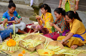 Women in Balinese culture have duties in preparing the offerings. Families and neighbours come together to make the offering. It is also the events of socializing. 